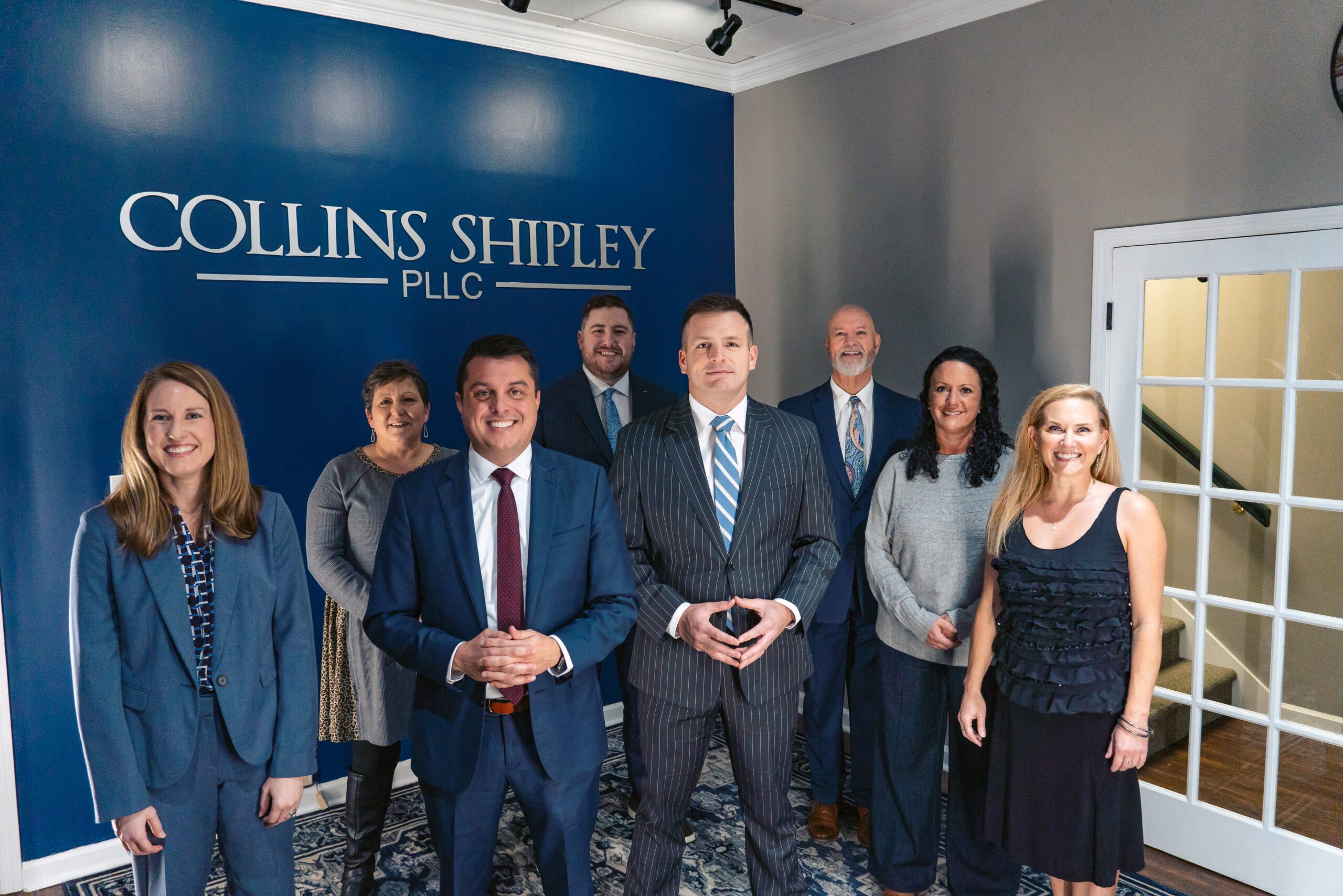 Legal team from Collins Shipley, PLLC